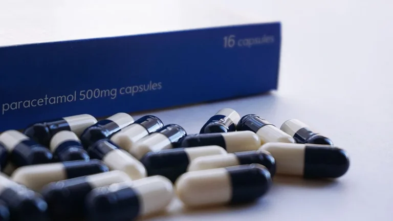 A detailed view of paracetamol 500mg capsules in a blister pack highlighting medication and healthcare.